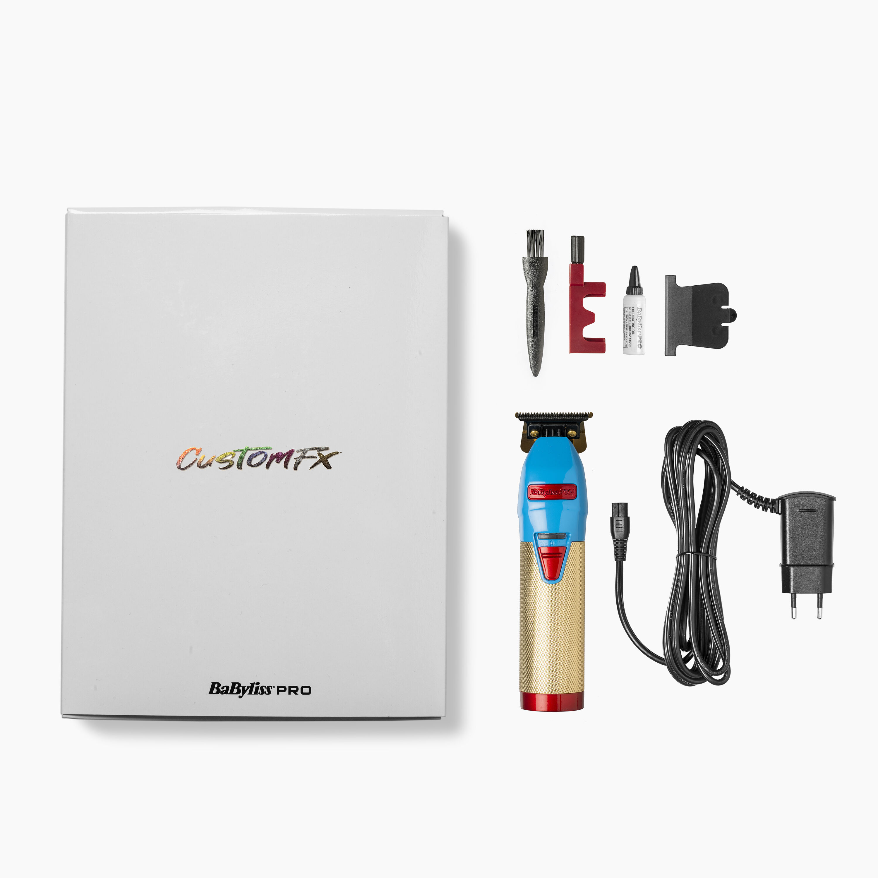 CustomFX Skeleton Trimmer, box, brushes, oil, blade guard and charging lead