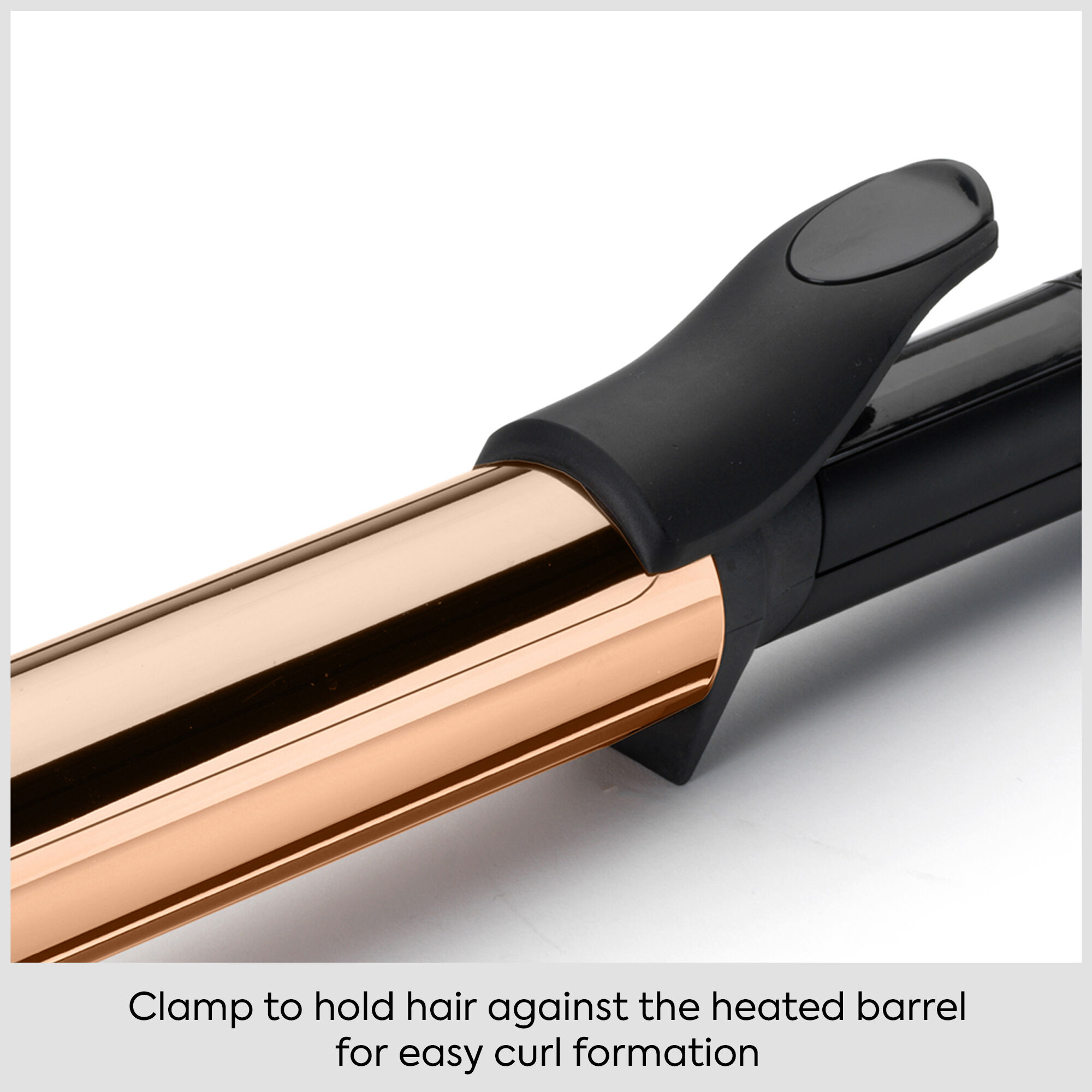 Clamp to hold hair against the heated barrel for easy curl formation