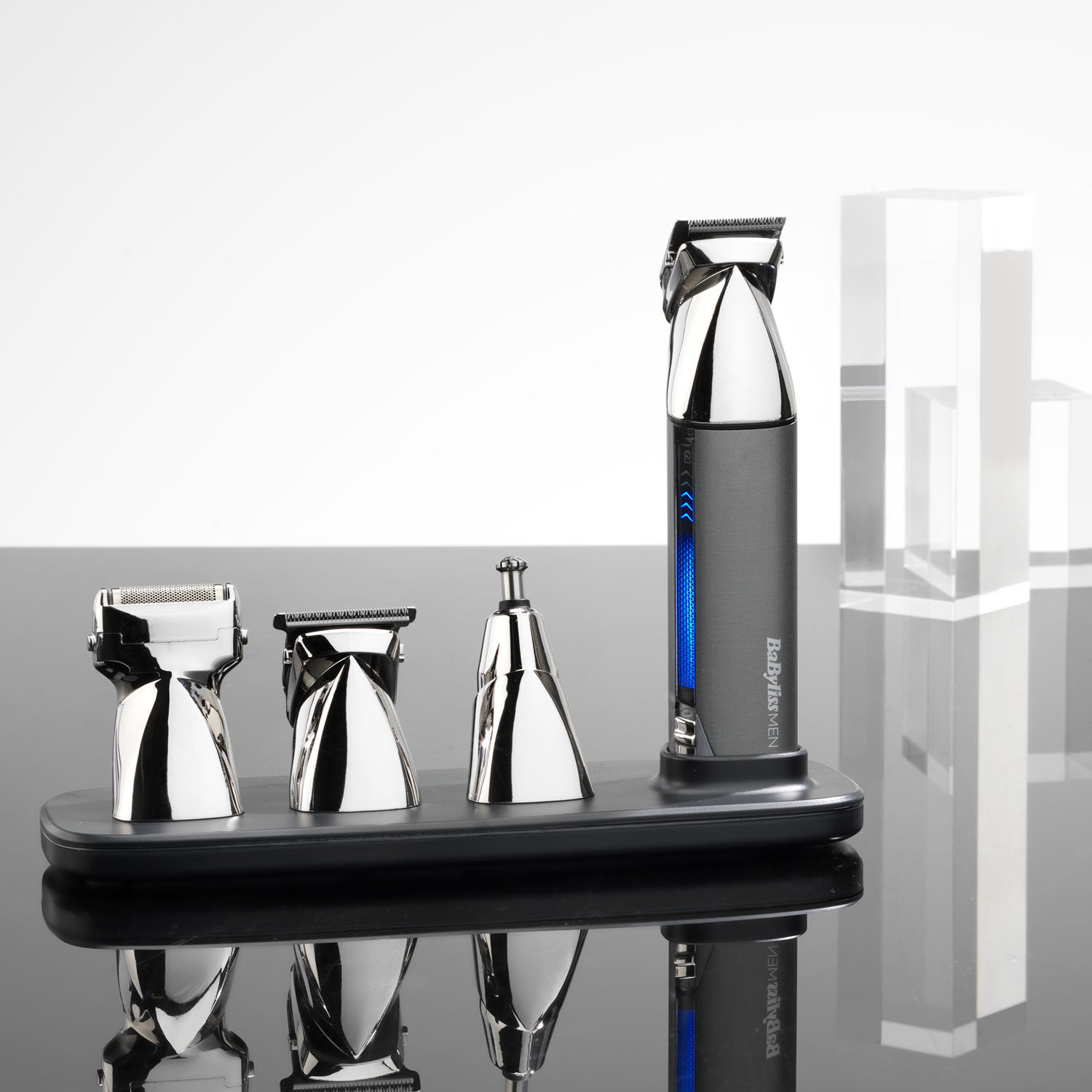 Super-X Metal Series 15 In 1 Multi Trimmer and different heads in stand on grey background